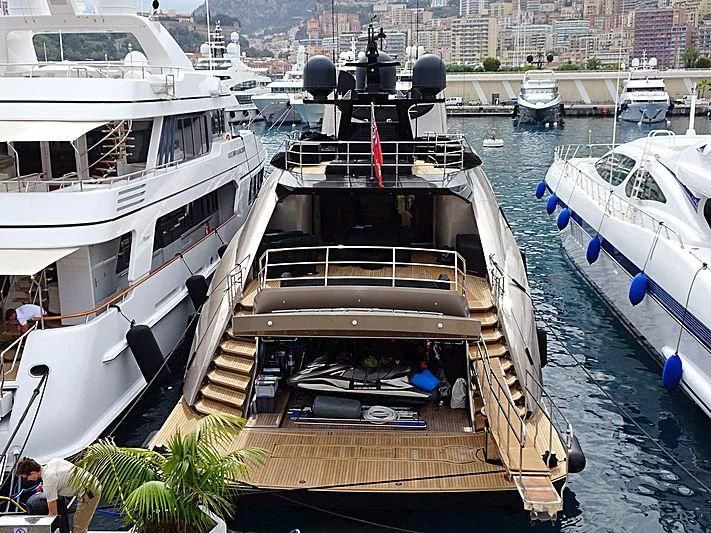 a boat is parked in the water aboard DEFIANT Yacht for Sale
