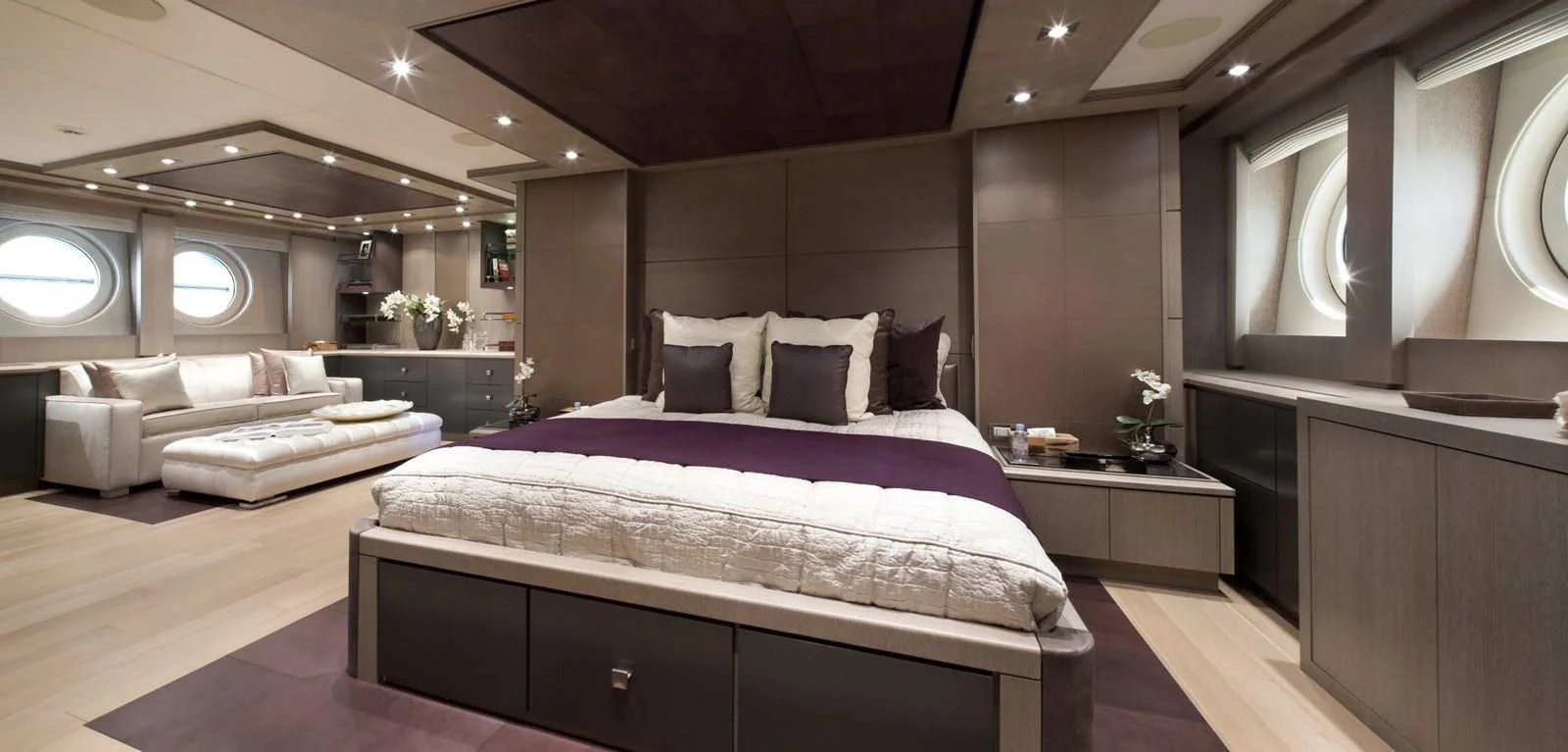 a large bedroom with a bed aboard DEFIANT Yacht for Sale