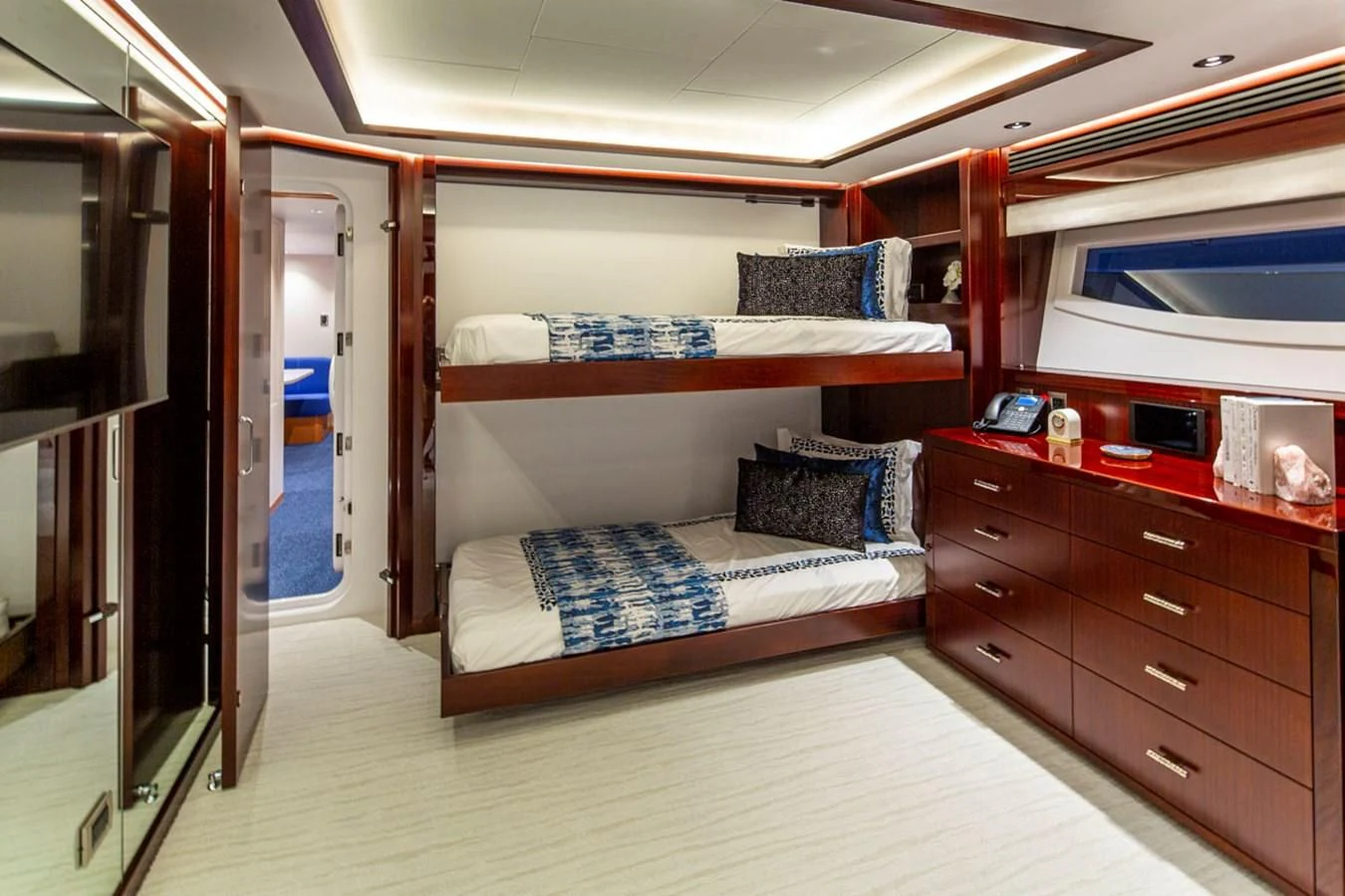 a bed in a room aboard LION'S DEN Yacht for Sale