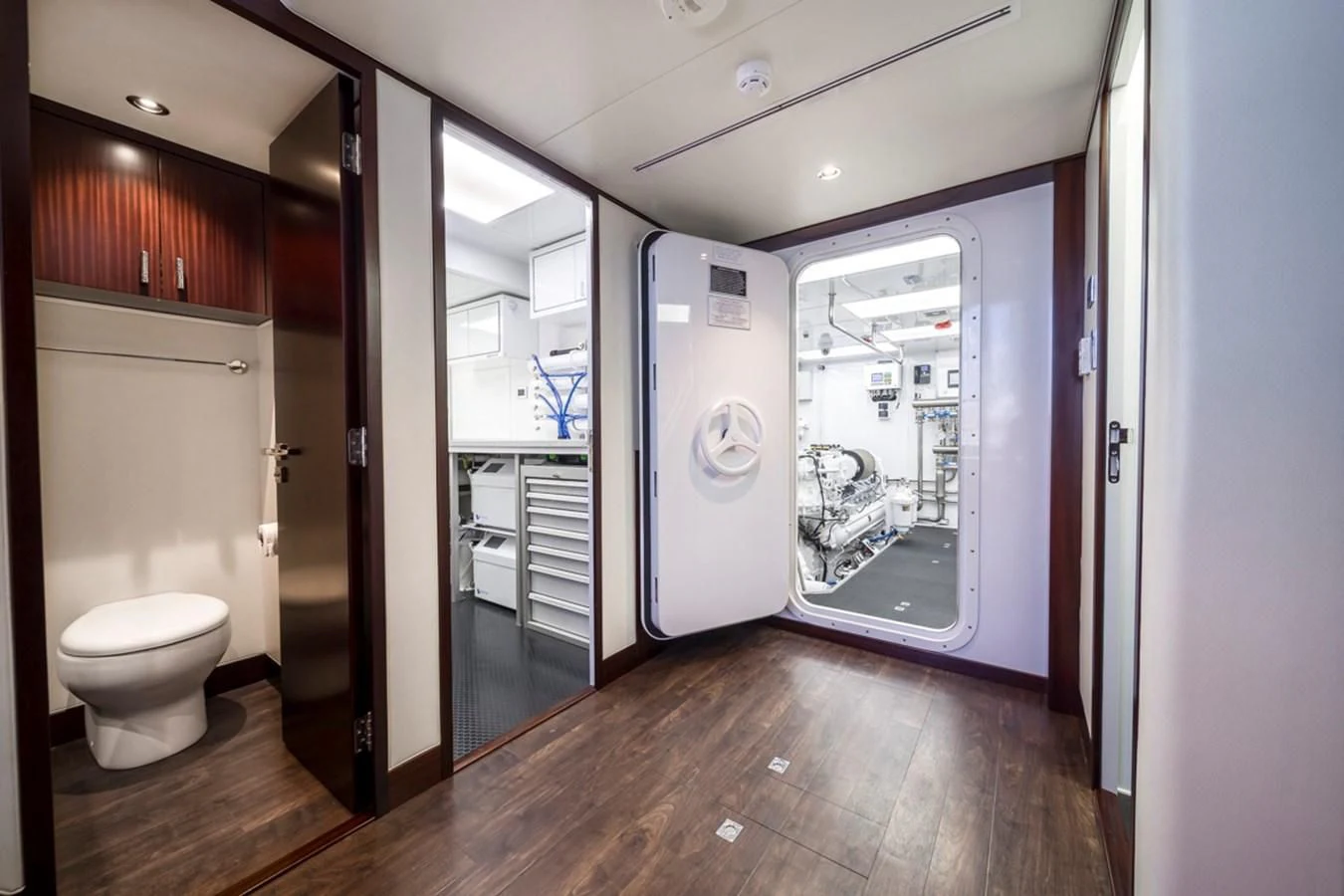 a bathroom with a large mirror aboard LION'S DEN Yacht for Sale