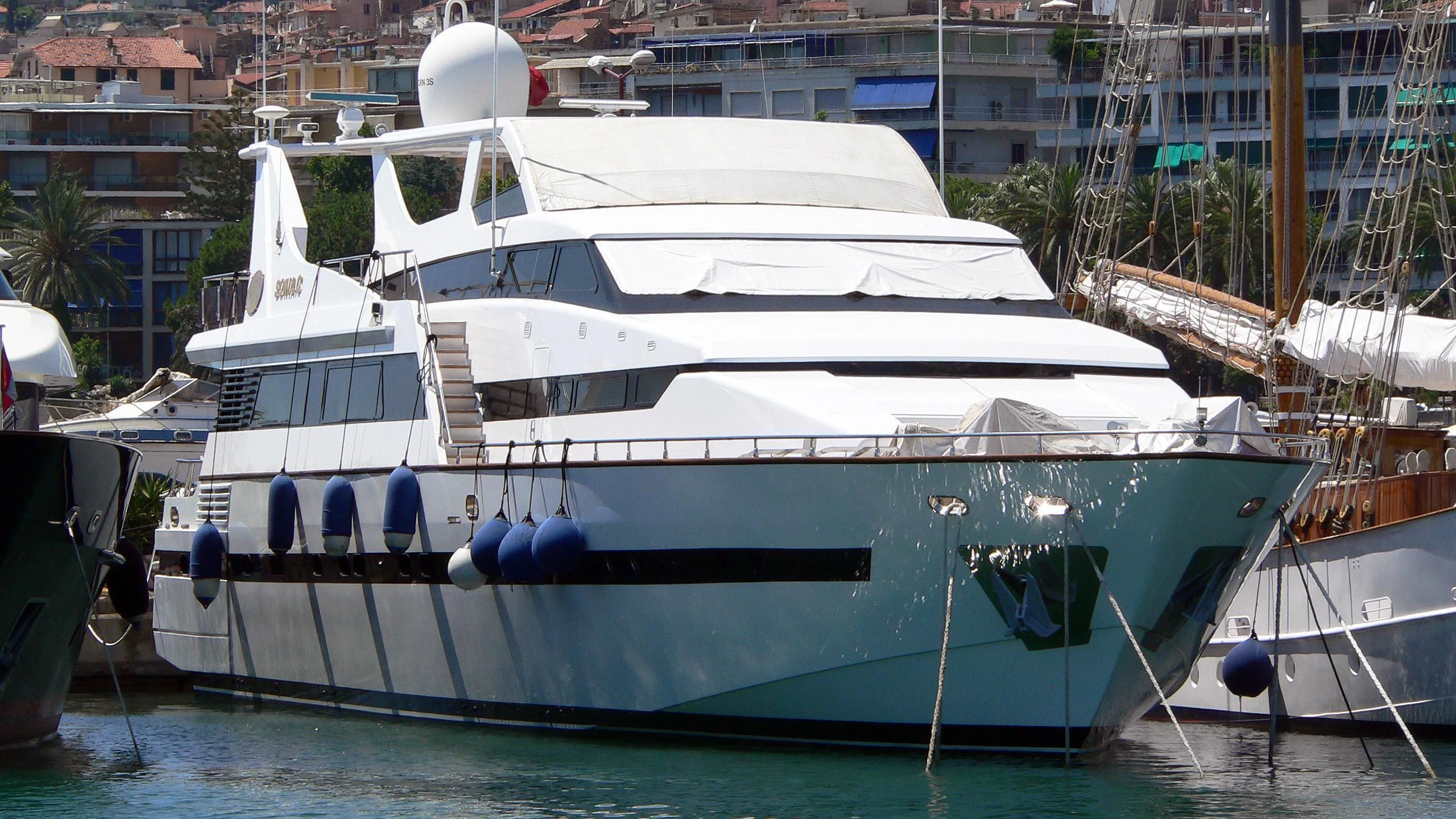 a boat docked in a harbor aboard SONIA C Yacht for Sale
