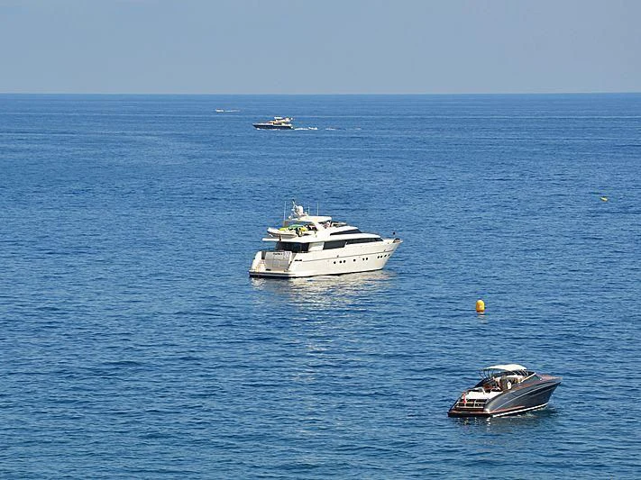 a group of boats in the water aboard MIRI Yacht for Sale