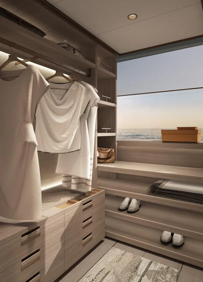 a room with a large window and a closet with a view of the ocean aboard NL45/01 Yacht for Sale