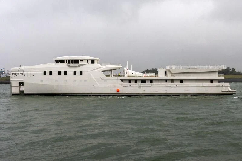a large white boat in the water aboard ABEONA Yacht for Sale