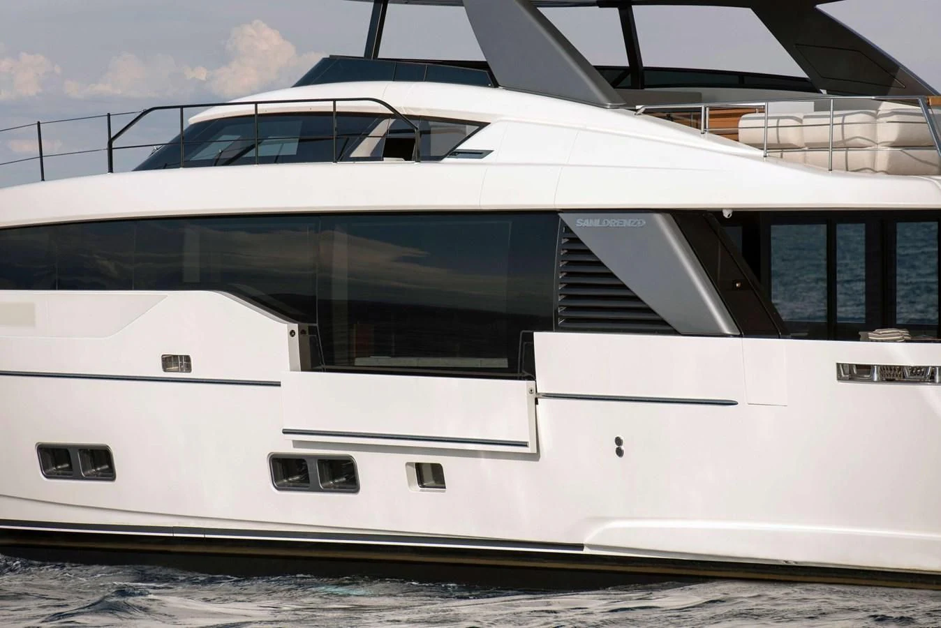 a white yacht on the water aboard 2022 SANLORENZO SL90A #786 Yacht for Sale