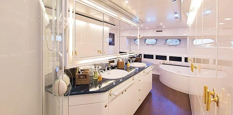 a bathroom with a sink and a bathtub aboard MEGI ONE Yacht for Sale
