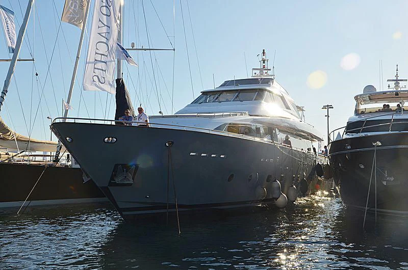 a couple of boats are parked in the water aboard MEGI ONE Yacht for Sale