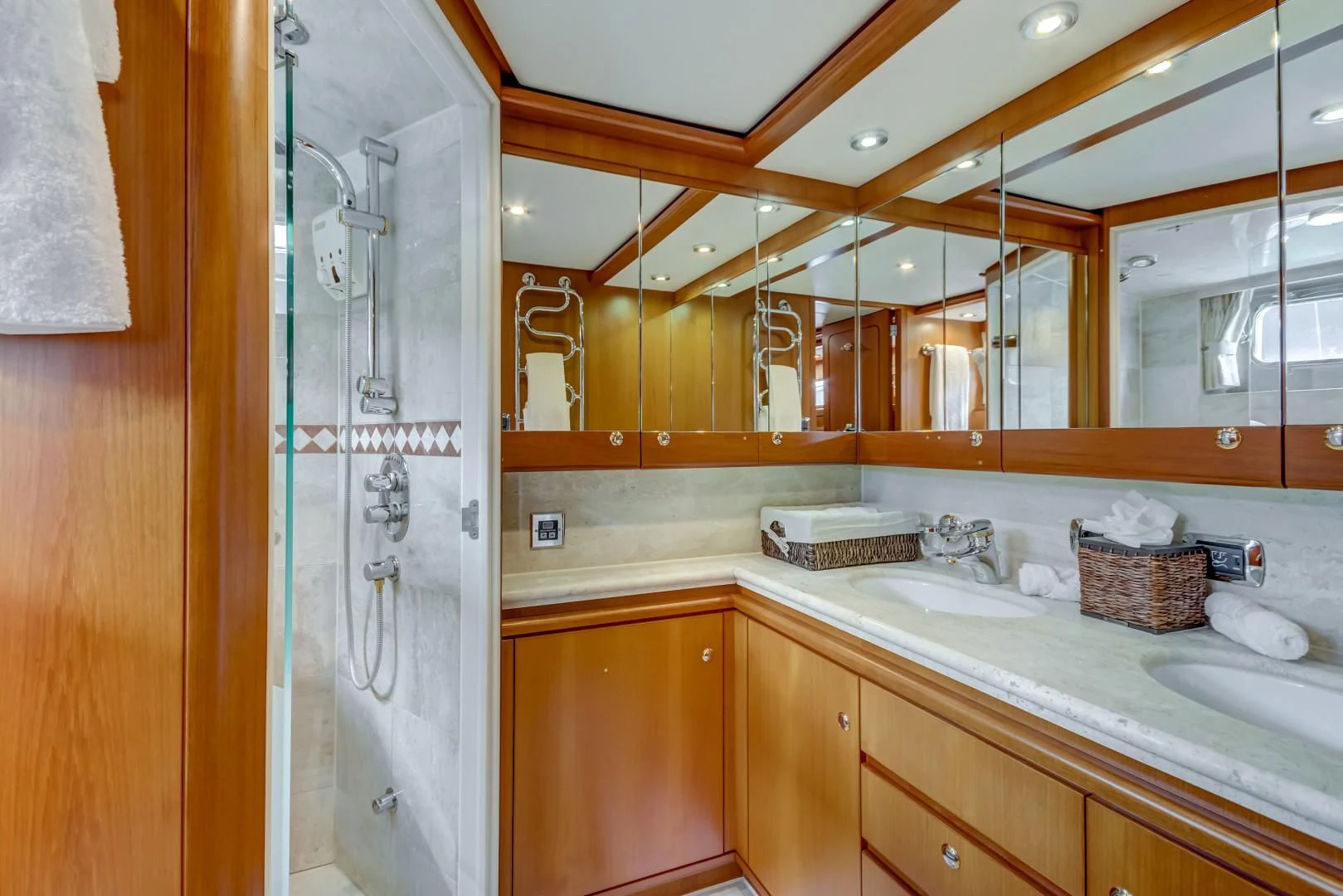 a bathroom with a shower and sink aboard GUSTO Yacht for Sale