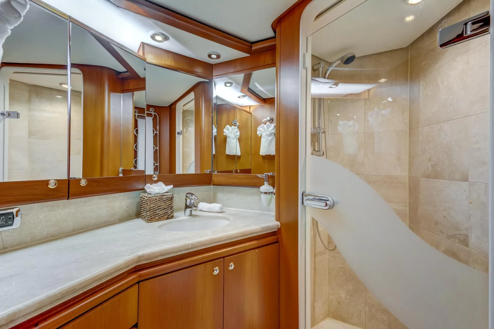 a bathroom with a large mirror aboard GUSTO Yacht for Sale