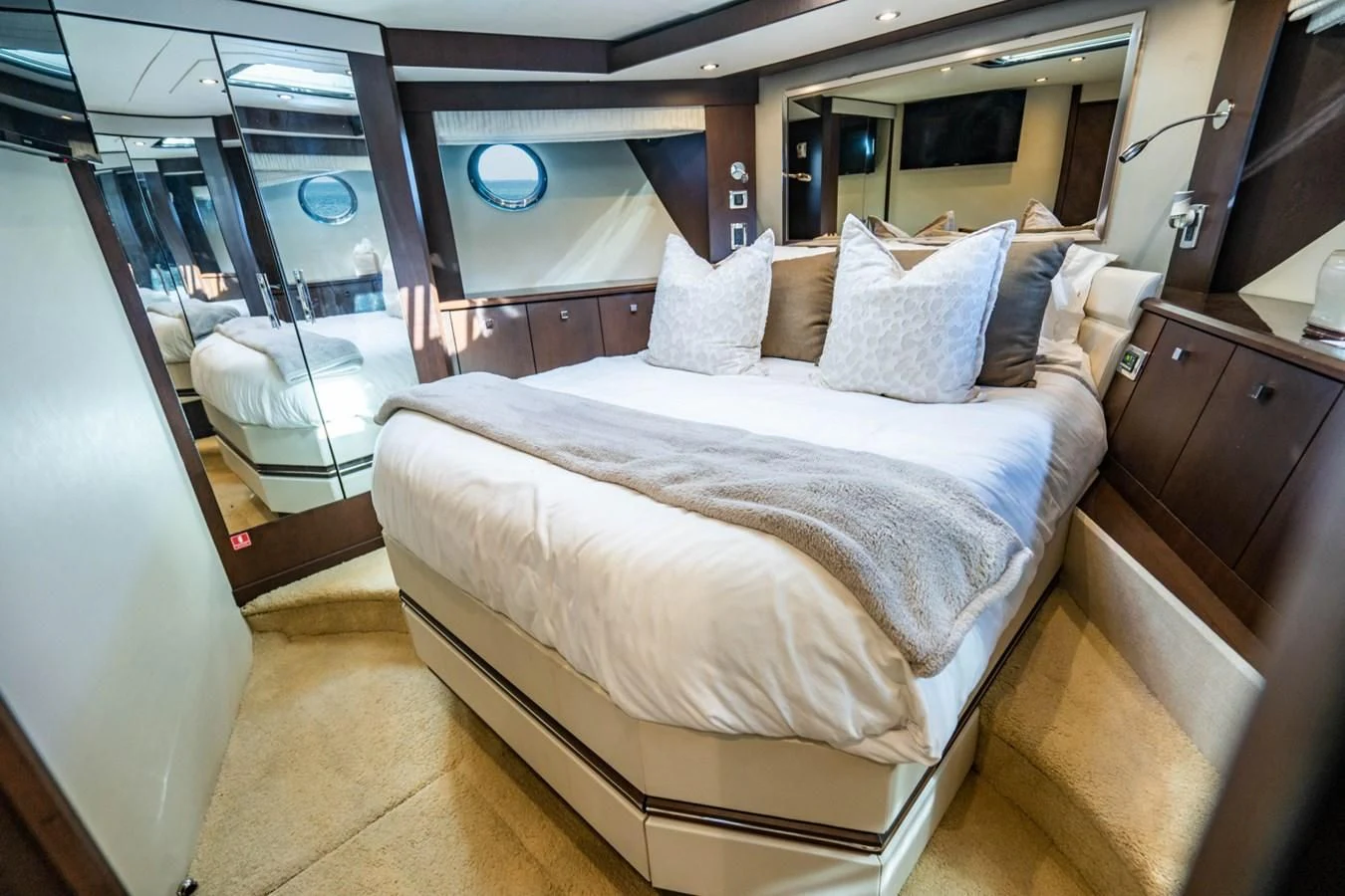 a bed in a room aboard MAYA Yacht for Sale