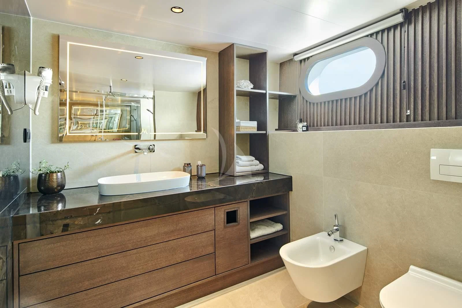 a bathroom with a large mirror aboard ANIMA MARIS Yacht for Sale
