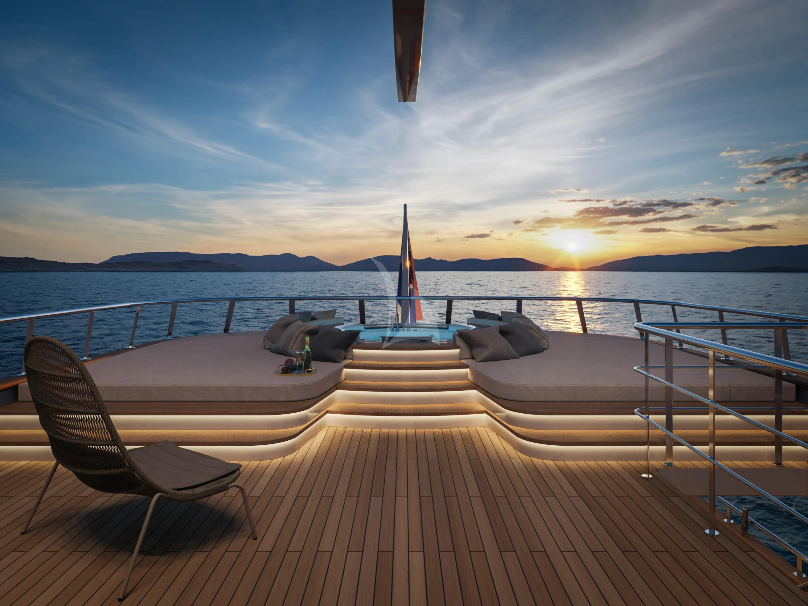 a deck with a view of the ocean and a sunset aboard ANIMA MARIS Yacht for Sale