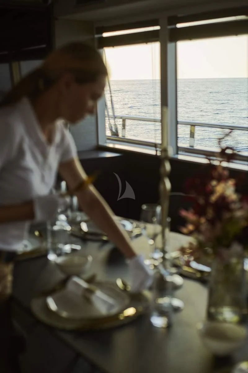 a person in a white shirt aboard ANIMA MARIS Yacht for Sale