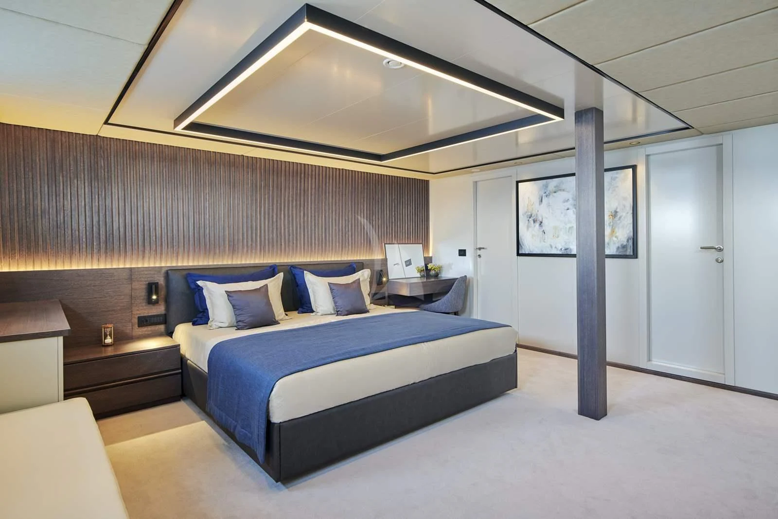 a large bed in a room aboard ANIMA MARIS Yacht for Sale