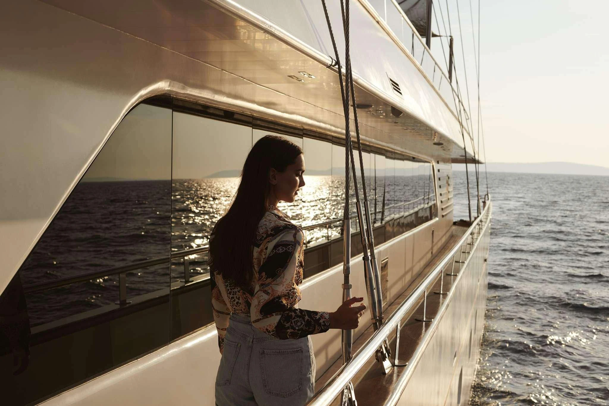 a person standing on a boat aboard ANIMA MARIS Yacht for Sale