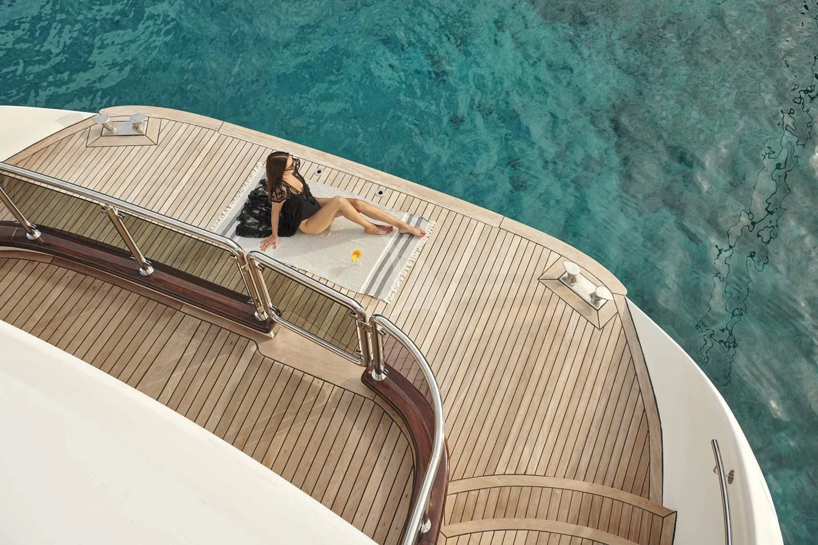 a person sitting on a boat aboard ANIMA MARIS Yacht for Sale