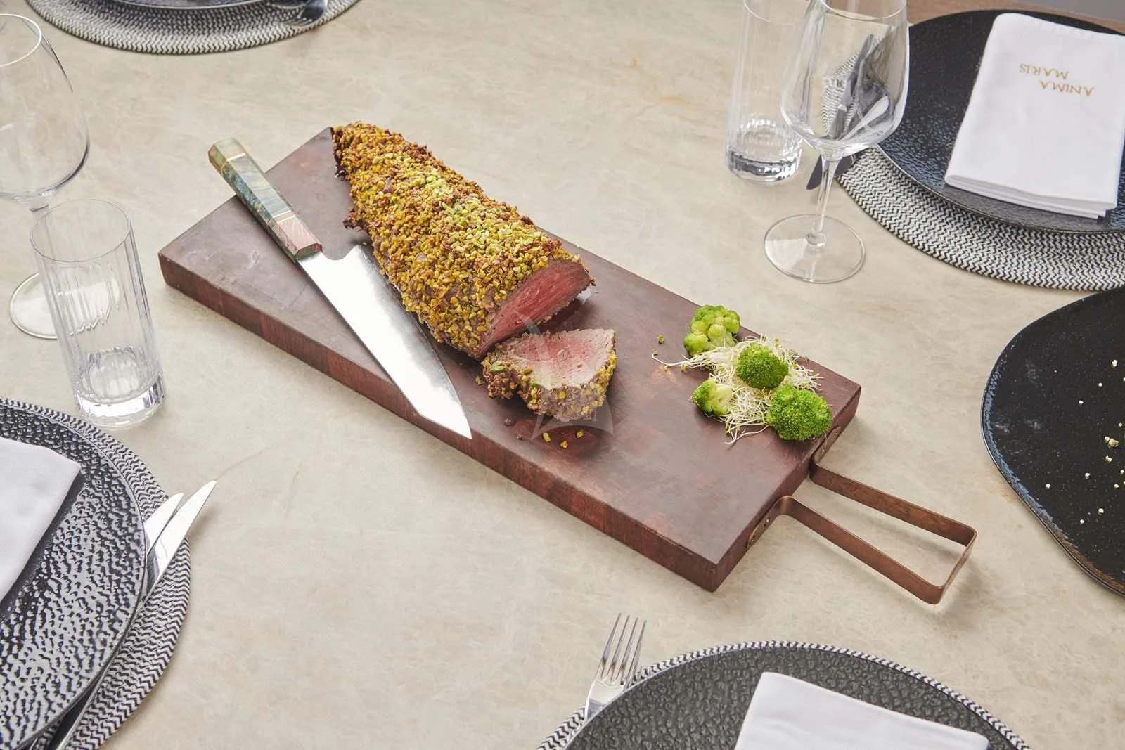 a cutting board with food on it aboard ANIMA MARIS Yacht for Sale