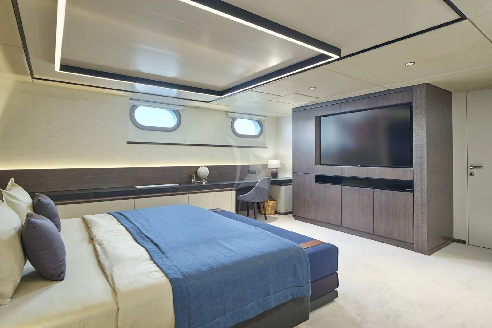 a room with a bed and a tv aboard ANIMA MARIS Yacht for Sale