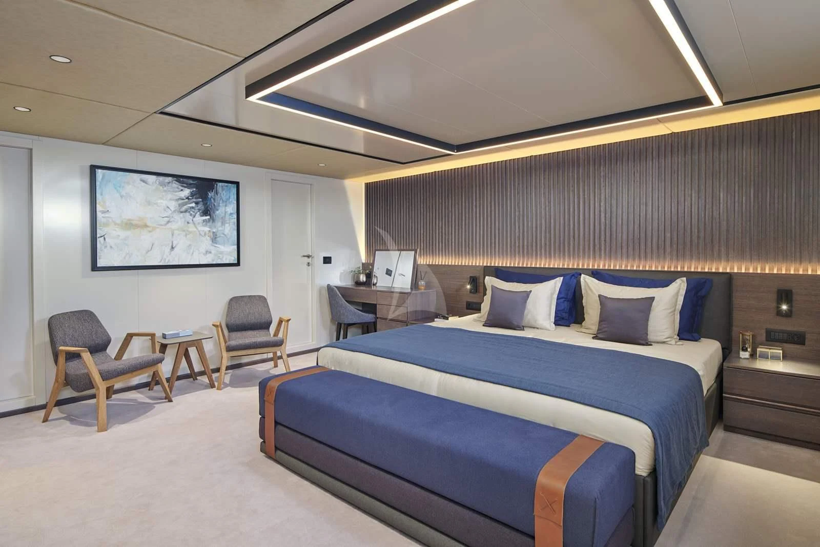 a room with a bed and a desk aboard ANIMA MARIS Yacht for Sale