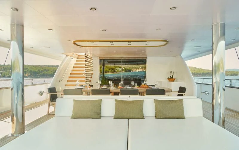 a large living room with a large open door aboard ANIMA MARIS Yacht for Sale