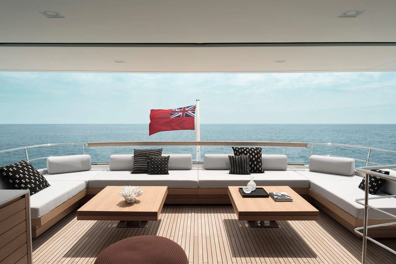 a room with a couch and a table and chairs aboard NADHIRA Yacht for Sale