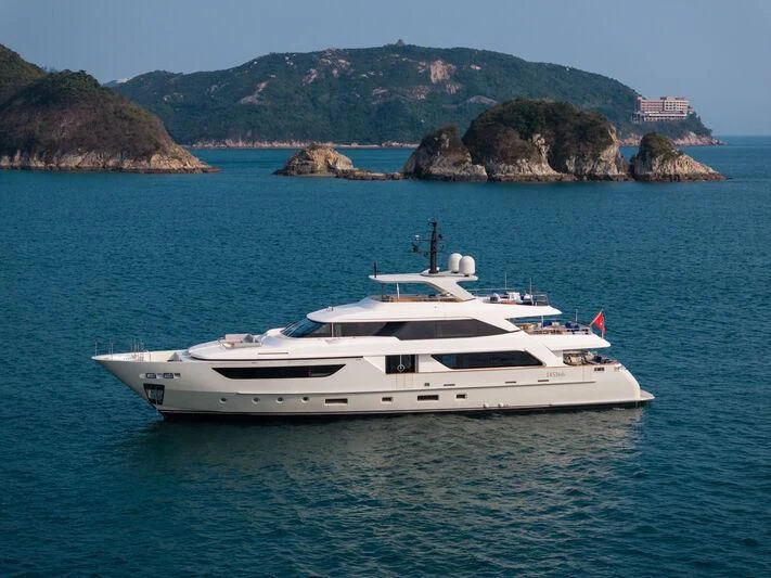 a white yacht in the water aboard NADHIRA Yacht for Sale
