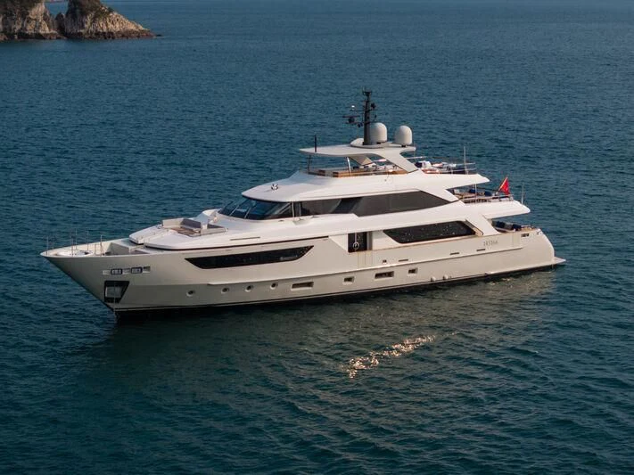 a white yacht in the water aboard NADHIRA Yacht for Sale