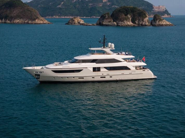 a white yacht in the water aboard NADHIRA Yacht for Sale