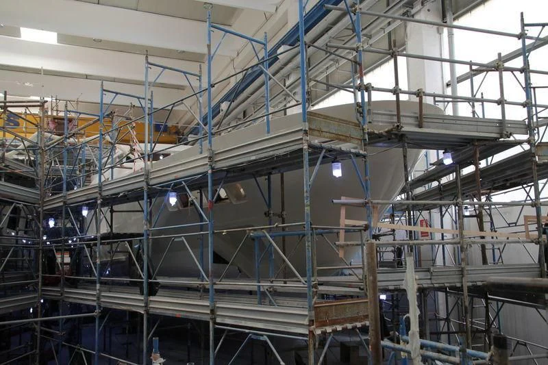 a large room with many pipes aboard NADHIRA Yacht for Sale