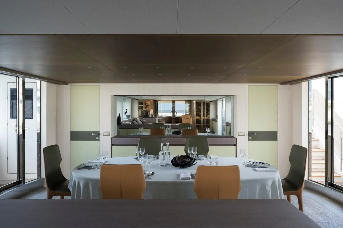 a large conference room with tables and chairs aboard NADHIRA Yacht for Sale