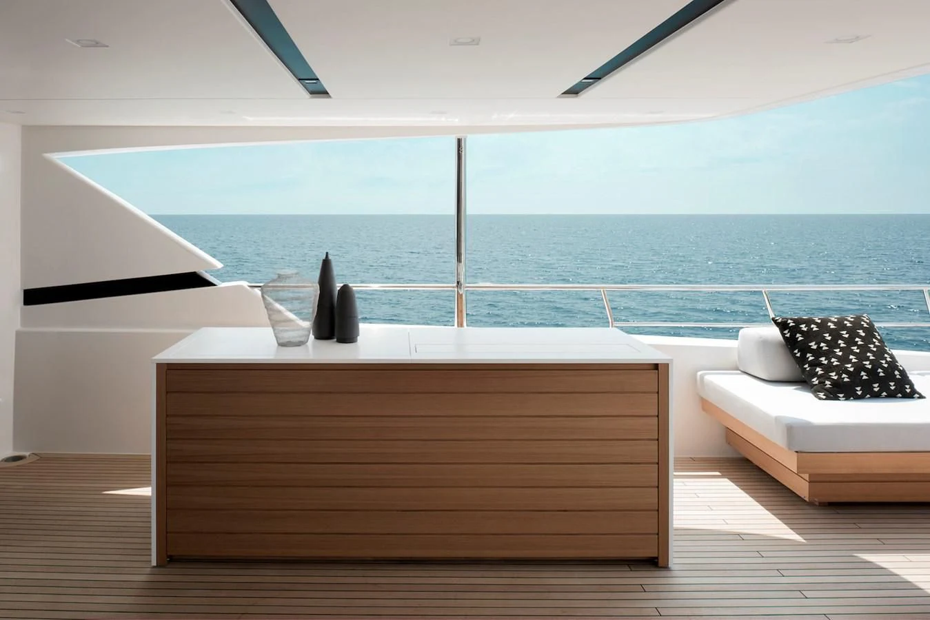 a room with a bed and a large body of water aboard NADHIRA Yacht for Sale