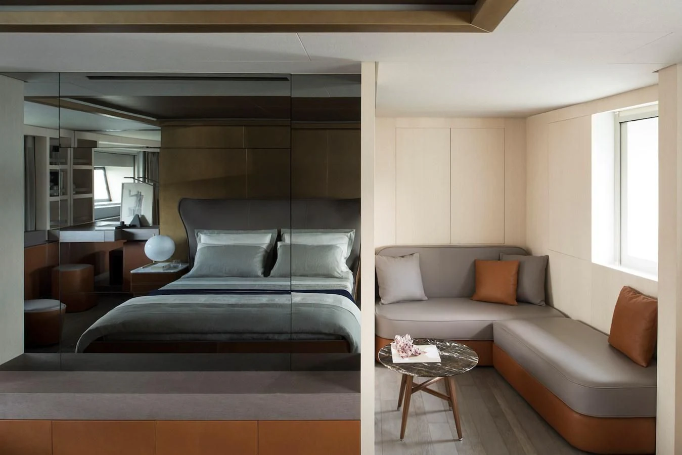 a living room with a couch and a coffee table aboard NADHIRA Yacht for Sale