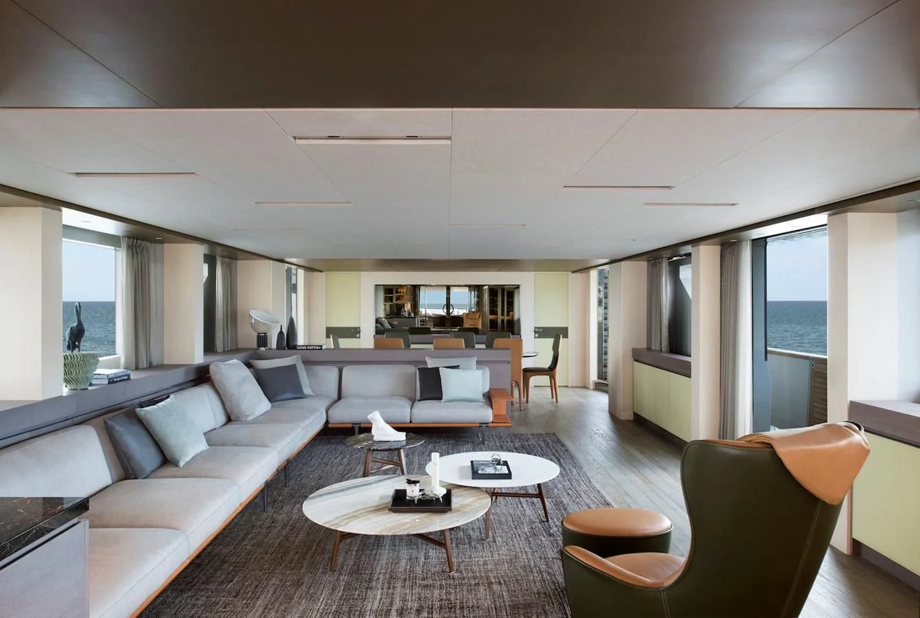 a living room with a couch and a table aboard NADHIRA Yacht for Sale
