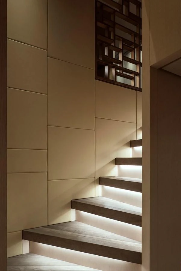 a staircase with a metal railing aboard NADHIRA Yacht for Sale