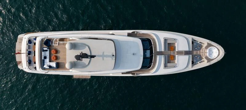 a white rectangular object with a black handle on a green surface aboard NADHIRA Yacht for Sale