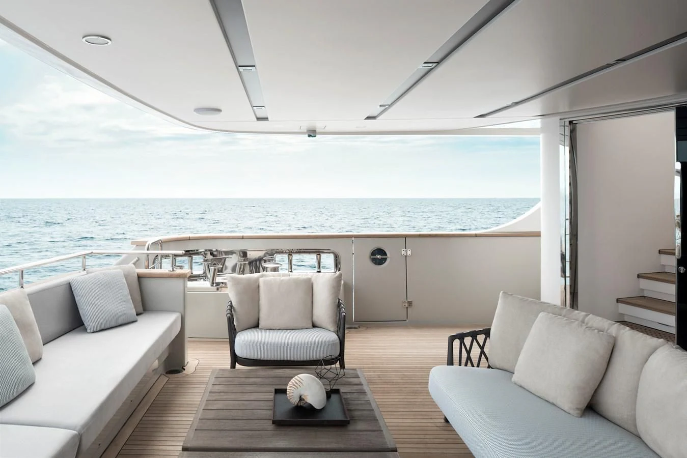 a large living room with a large ocean view aboard NADHIRA Yacht for Sale