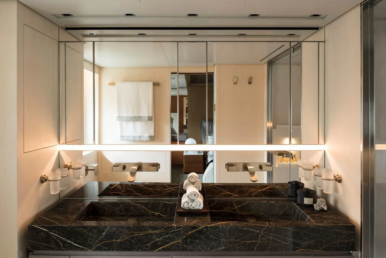a cat sitting on a counter aboard NADHIRA Yacht for Sale