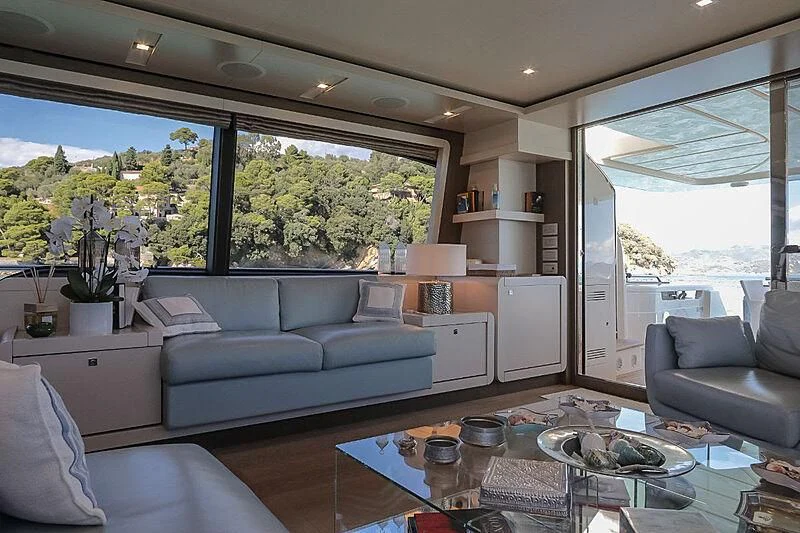 a living room with a large window aboard RURI Yacht for Sale