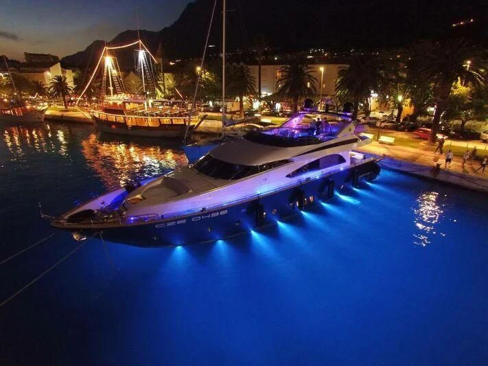 a boat in a harbor aboard HITECH RACING Yacht for Sale