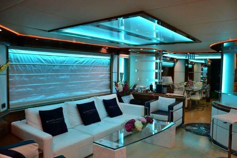 a living room with a large window aboard HITECH RACING Yacht for Sale