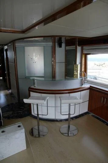 a large white bathtub in a room with a window aboard HITECH RACING Yacht for Sale