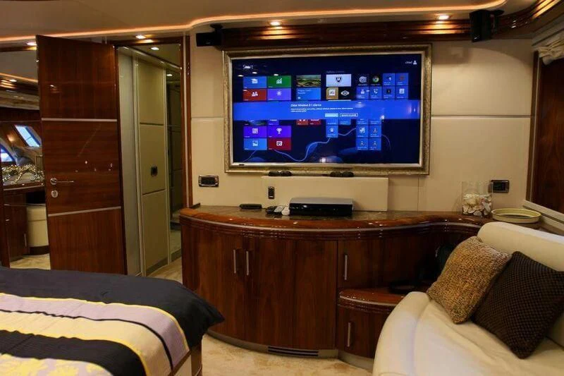 a tv on a wall aboard HITECH RACING Yacht for Sale