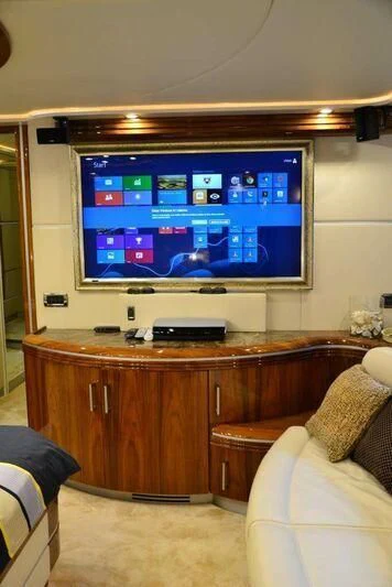 a tv on a wall aboard HITECH RACING Yacht for Sale