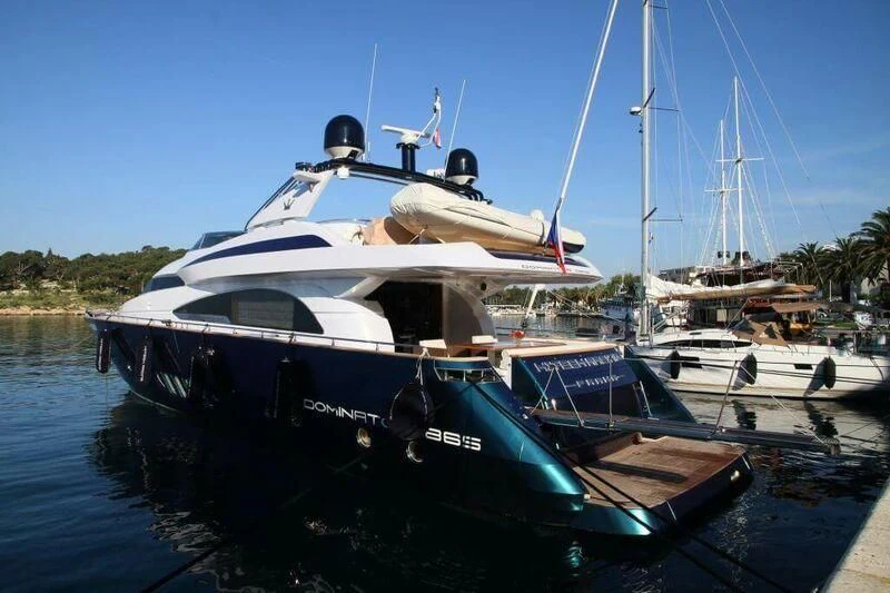 a boat docked at a pier aboard HITECH RACING Yacht for Sale