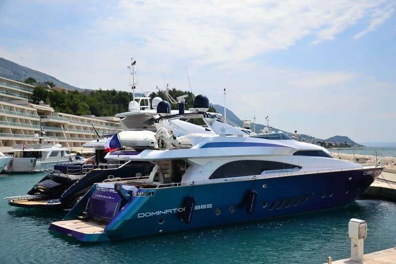 a boat docked at a pier aboard HITECH RACING Yacht for Sale