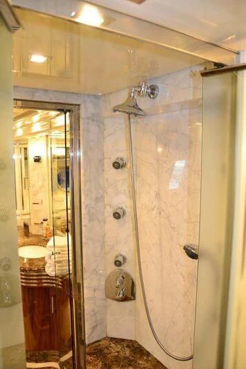 a shower with a glass door aboard HITECH RACING Yacht for Sale