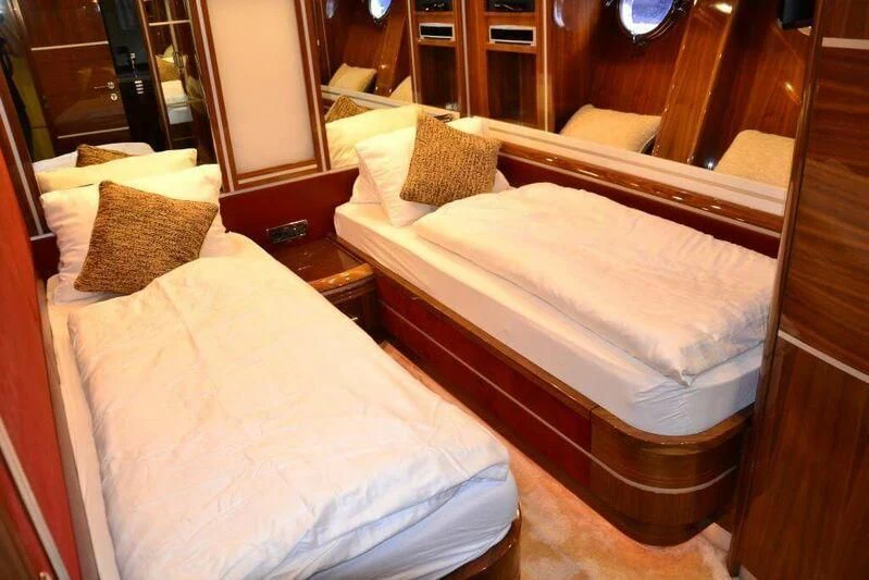 a couple of beds in a room aboard HITECH RACING Yacht for Sale