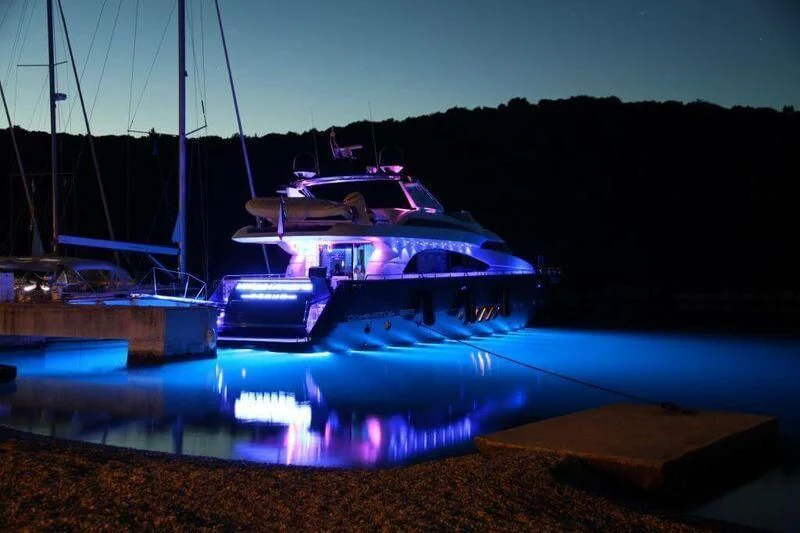 a car on a road aboard HITECH RACING Yacht for Sale