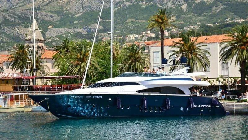 a boat docked at a pier aboard HITECH RACING Yacht for Sale