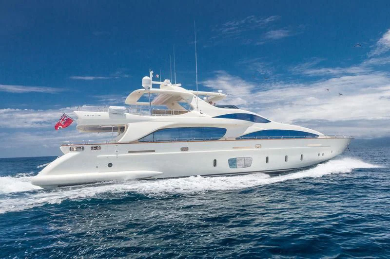a white yacht in the water aboard AMANECER Yacht for Sale